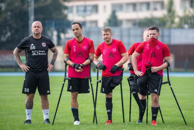 Scott Rogers with some of the England players