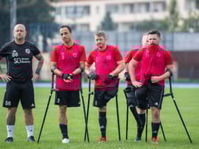 Scott Rogers with some of the England players