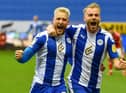 Jack Whatmough celebrates Stephen Humphrys' winning goal against Charlton