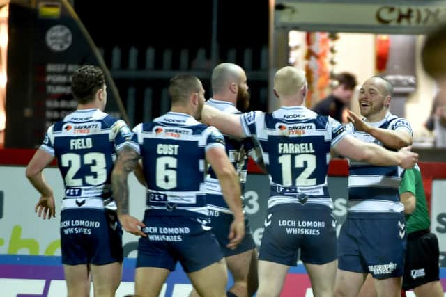 Wigan Warriors beat Hull KR in their opening Super League game of the season