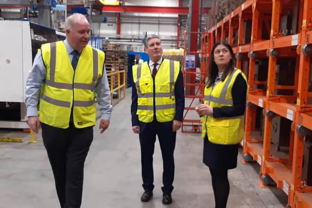 What More director Tony Grimshaw OBE shows Labour leader Sir Keir Starmer and Wigan MP Lisa Nandy around the facility