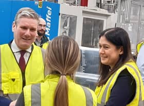 Labour leader Sir Keir Starmer and Shadow Levelling up Secretary Lisa Nandy chat to a worker at What More