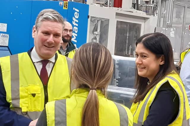 Labour leader Sir Keir Starmer and Shadow Levelling up Secretary Lisa Nandy chat to a worker at What More