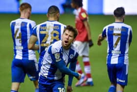 Callum Lang celebrates scoring the opening goal against Crewe