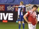 James McClean celebrates scoring Latics' second goal