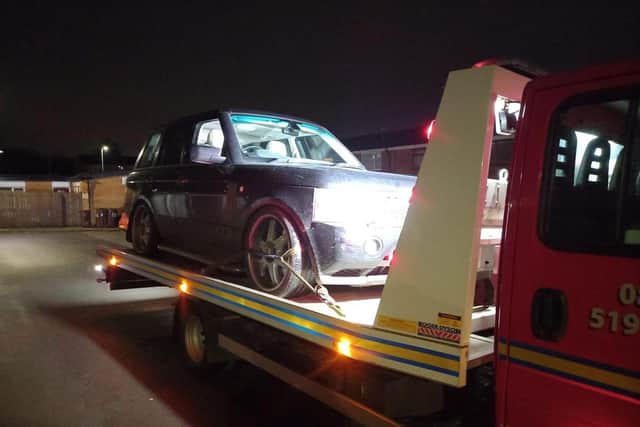 The car is put on a low loader