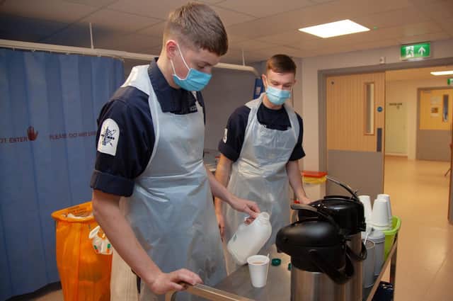 Weapon Engineers William Smith and Owen Woodhouse, making cups of tea and coffee for patients on Bryn Ward North