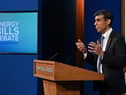 Chancellor Rishi Sunak announced a £200 rebate on energy bills, which will have to be paid back, and a £150 reduction in council tax for millions in England.