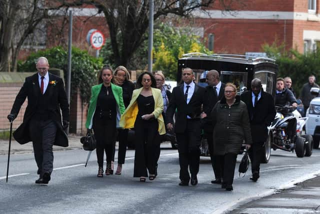 Mourners wore a splash of colour to mark his love for Bob Marley