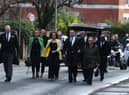 Mourners wore a splash of colour to mark his love for Bob Marley