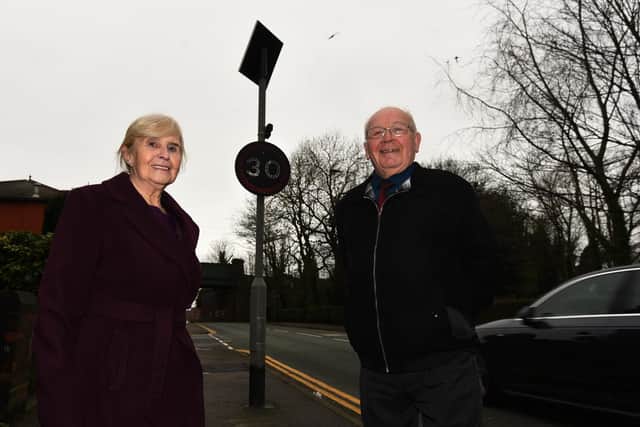 Councillors Phyll Cullen and George Davies with the new sign