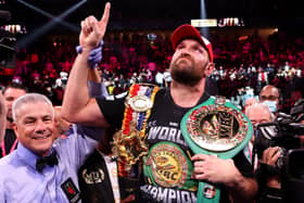 Tyson Fury celebrates his 11th round knock out win against Deontay Wilder after their WBC heavyweight title fight at T-Mobile Arena on October 09, 2021 in Las Vegas, Nevada.