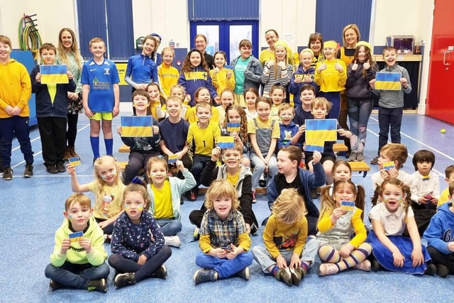 All the children at Holmeswood Methodist School wore blue and yellow to stand with Ukraine and the appeal