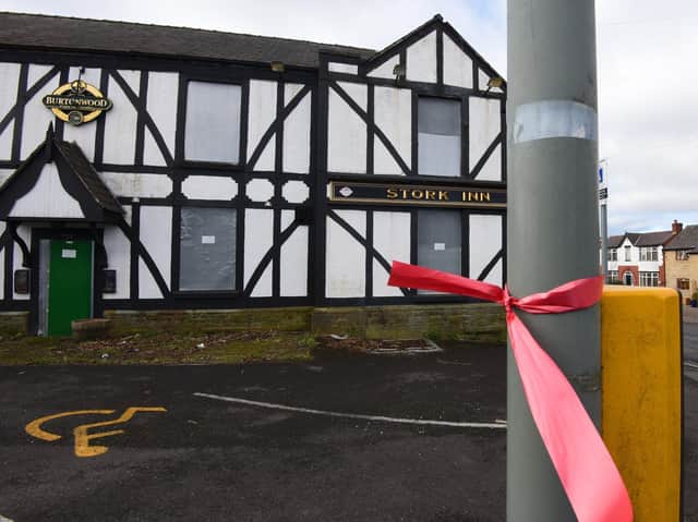 Red ribbons, part of the Save Our Stork campaign