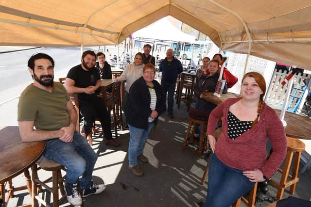 Staff at Wigan Central ahead of the micropub's reopening today