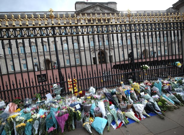 Tributes left at Buckingham Palace (Picture: Press Association)