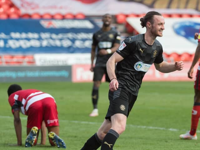 Will Keane celebrates scoring the fourth goal