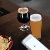 Older drinkers without smartphones at risk of discrimination in pubs