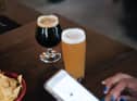 Older drinkers without smartphones at risk of discrimination in pubs