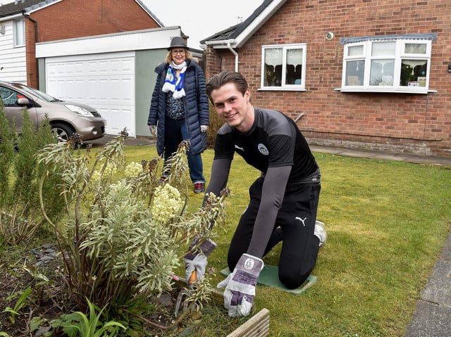 Latics player Tom Pearce and lifelong fan Bernie Green