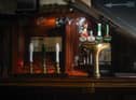 Beer pumps sit dormant in a pub during the pandemic lockdown in March.