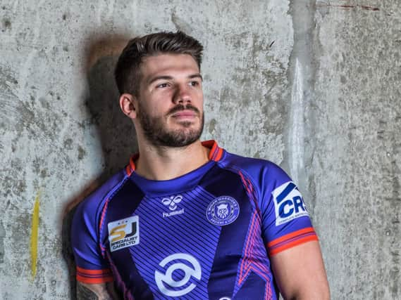 Oliver Gildart in the new alternative purple kit