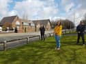 Coun Chris Ready, Laura Flynn and Coun Ron Conway outside the former school