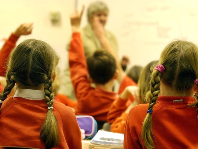 Primary school pupils in class