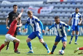 Lee Evans and Funso Ojo dominate the midfield against Crewe