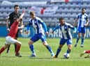 Lee Evans and Funso Ojo dominate the midfield against Crewe