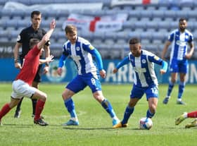 Lee Evans and Funso Ojo dominate the midfield against Crewe