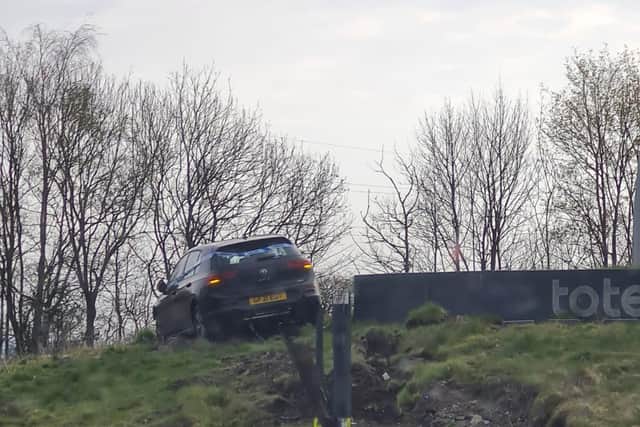 The car on top of the roundabout
