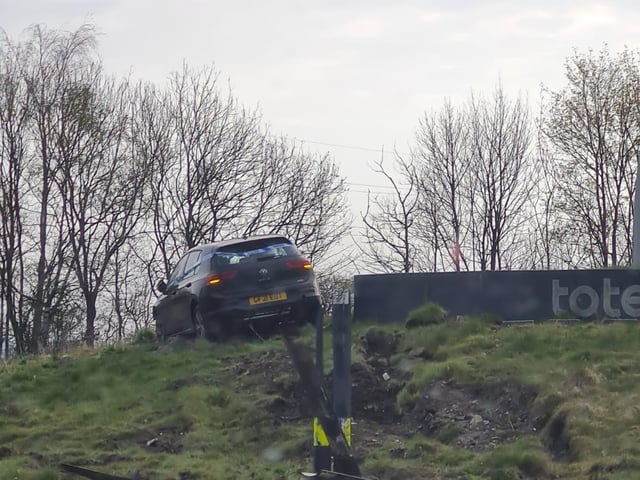 The car on top of the roundabout