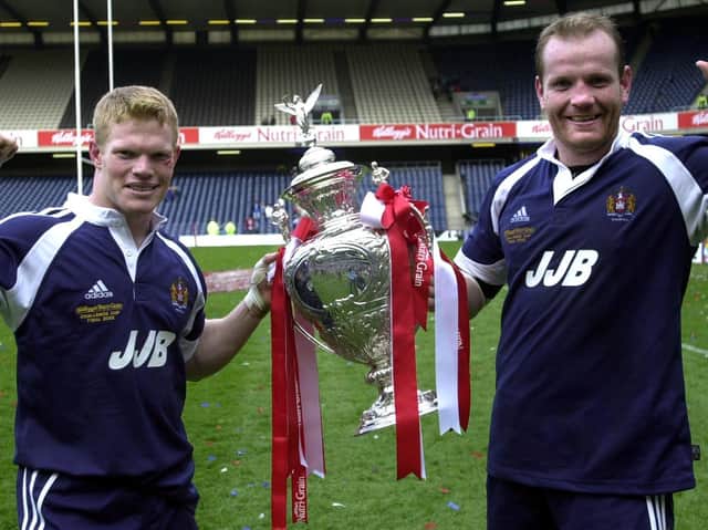 Dallas and Terry O'Connor with the Challenge Cup in 2002