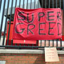 One of a number of banners left outside Anfield this week, with similar scenes at Old Trafford and the Etihad Stadum