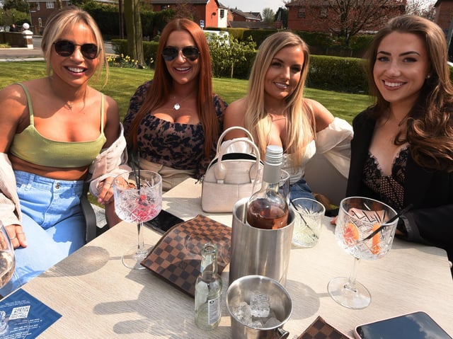 Drinkers at Albert's in Standish enjoy the sun
