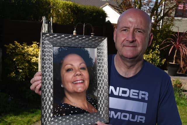 Ian Barlow, from Orrell, with a picture of his late wife Michelle