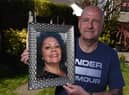 Ian Barlow, from Orrell, with a picture of his late wife Michelle