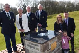 Members of the golf club's committee and Fred Burchall's family at the fountain