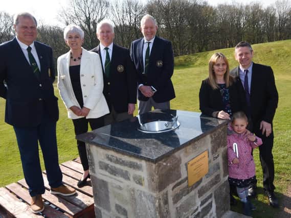 Members of the golf club's committee and Fred Burchall's family at the fountain