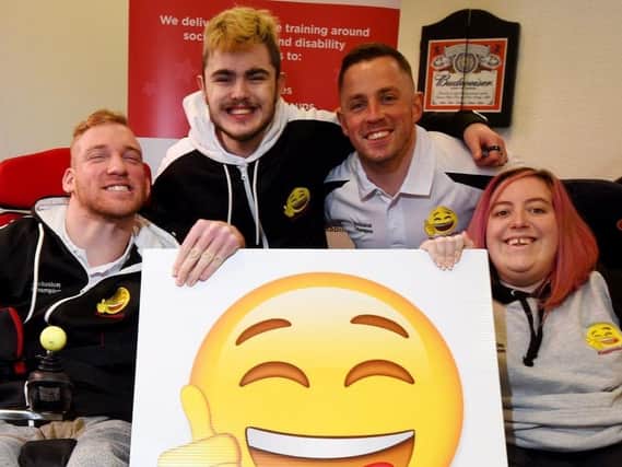 Happy Smiles founder Alex Winstanley (second right) with Haydn Smith, Kurt Watson and Ellie Greenawary, members of Happy Smiles CIC