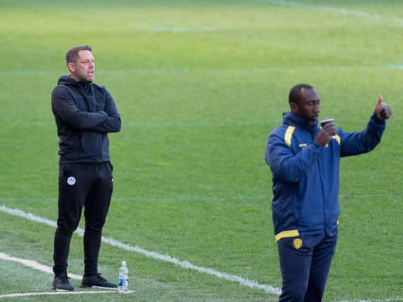 Jimmy Floyd Hasselbaink (right) with Leam Richardson in the technical area