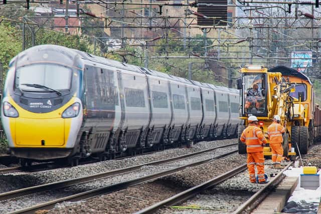 A train passes engineering work on the West Coast main line. Rail passengers are being warned of disruption on the line this May bank holiday weekend. Picture courtesy Network Rail