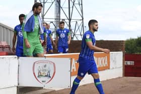 Sam Morsy leads out Latics