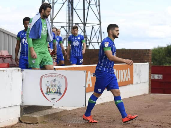 Sam Morsy leads out Latics