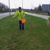 Ron Wade (pictured right) with Kieran Sayer from Wigan Council seeding the grassed area in Standish