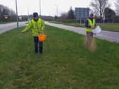 Ron Wade (pictured right) with Kieran Sayer from Wigan Council seeding the grassed area in Standish