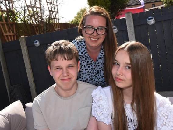 Nikki Ashcroft form Wigan with son Brooke, 14, and daughter Amelia, 12, right