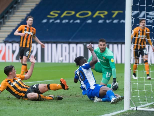 Joe Dodoo slides in the equaliser
