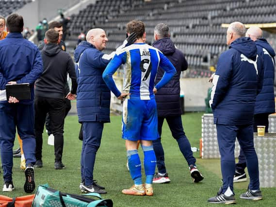 Callum Lang joins the post-match celebrations